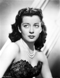Gail Russell posed in corset and pearl necklace photo print