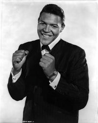 Chubby Checker smiling photo print showcasing classic music culture.