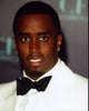 Diddy in white suit with black bowtie photo print