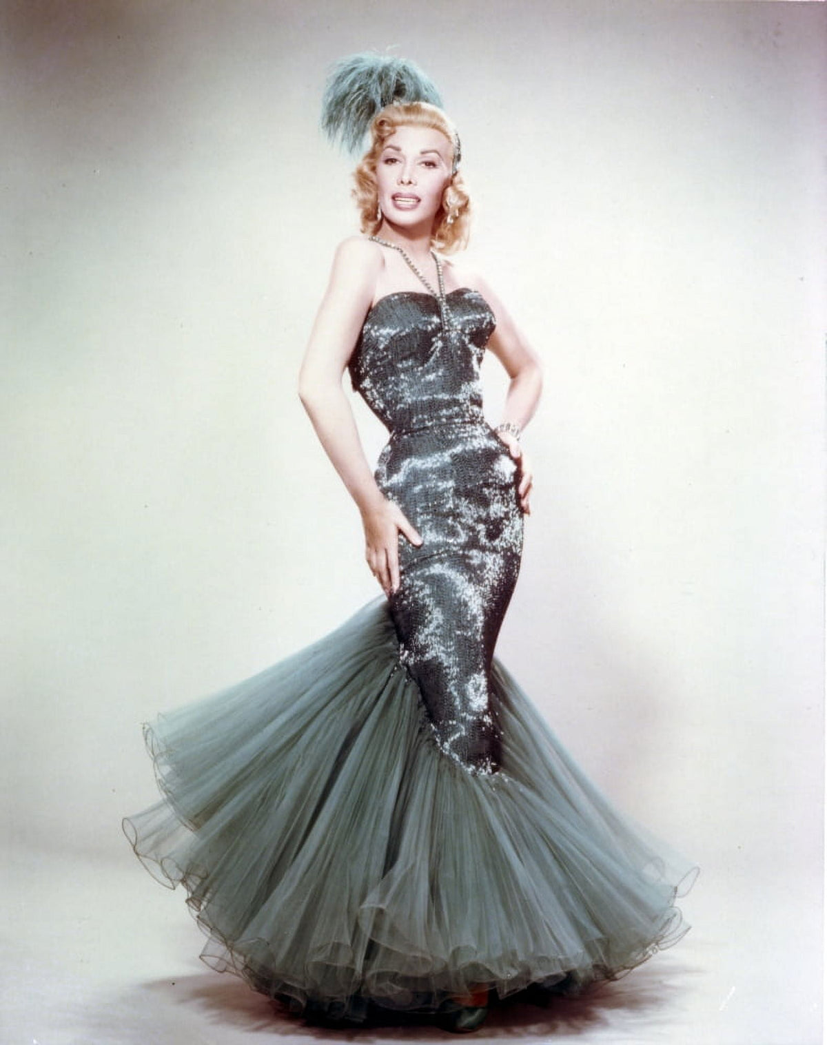 Dolores Gray posed in a green dress photo print