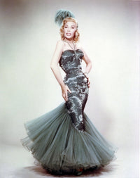 Dolores Gray posed in a green dress photo print