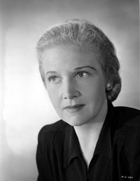 Ann Harding portrait photo print looking away in black blouse.