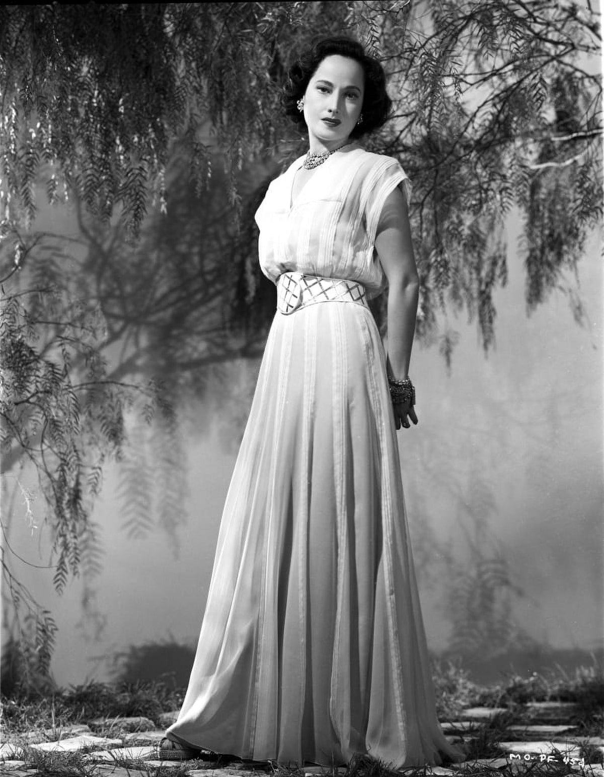 Elegant photo print of Merle Oberon in a dress, classic Hollywood art.