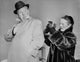 Alfred Hitchcock with a Lady photo print showcasing iconic cinematic style.