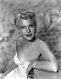 Peggy Lee seated in white gown with pearl necklace portrait photo print