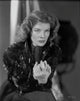 Katherine Hepburn posed in a classic black dress photo print