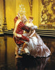 Yul Brynner dancing with a lady in shiny dress photo print.