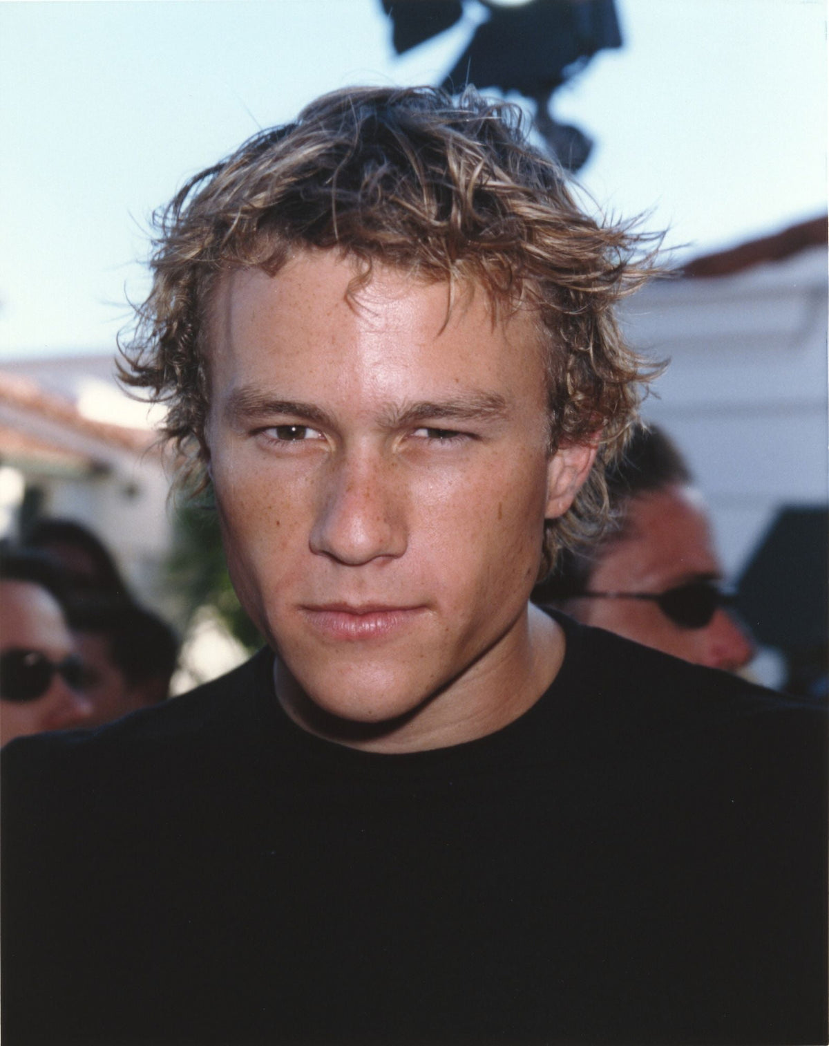 Heath Ledger in a black shirt photo print, iconic image.