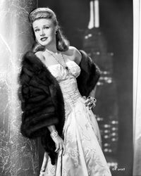 Elegant black and white photo print of Ginger Rogers posed in a white gown