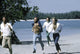 Bee Gees running on the beach photo print in vibrant colors.