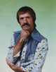 Sonny Bono posed in printed long sleeve polo photo print