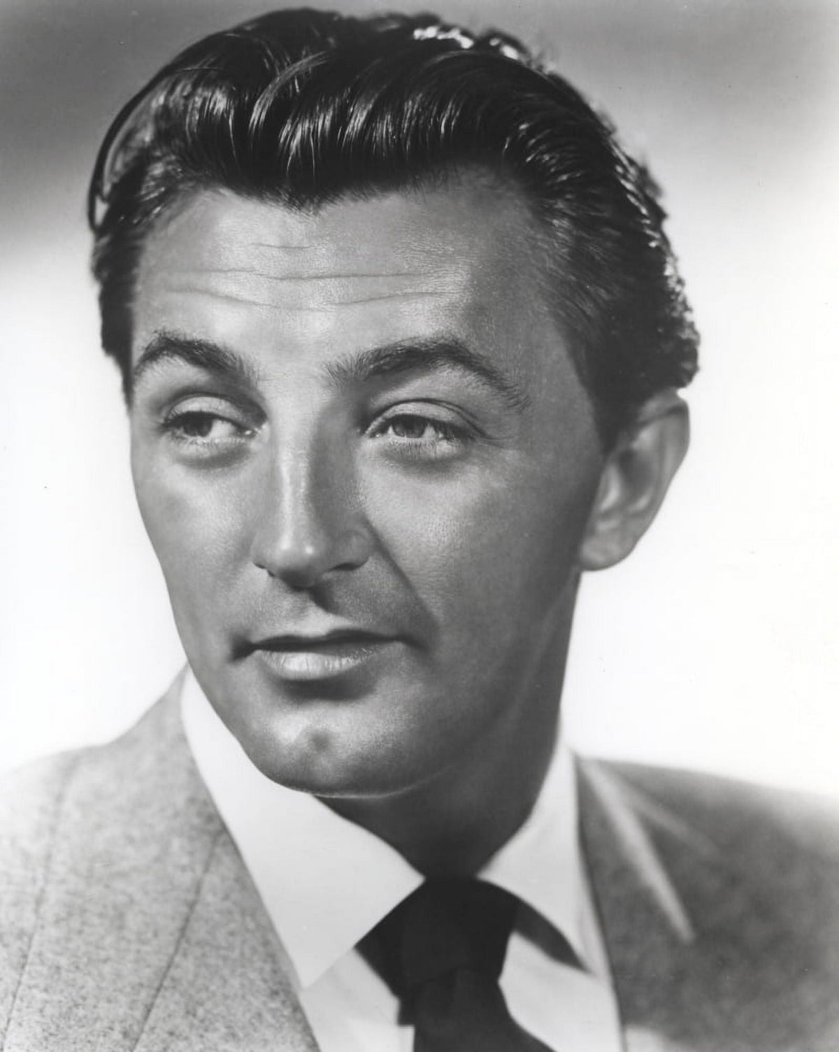 Robert Mitchum iconic photo print showcasing classic Hollywood charm