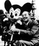 Walt Disney and Mickey Mouse photo print capturing iconic moments.