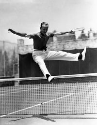 Fred Astaire leaping over a tennis net - Black and White Photo Print