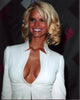 Jessica Simpson photo print in open white blazer, stylish and chic.