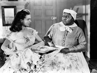 Gone With The Wind scene photo print featuring a lady dressed by Mammy.