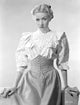 Gloria Grahame posed elegantly in a printed dress photo print.