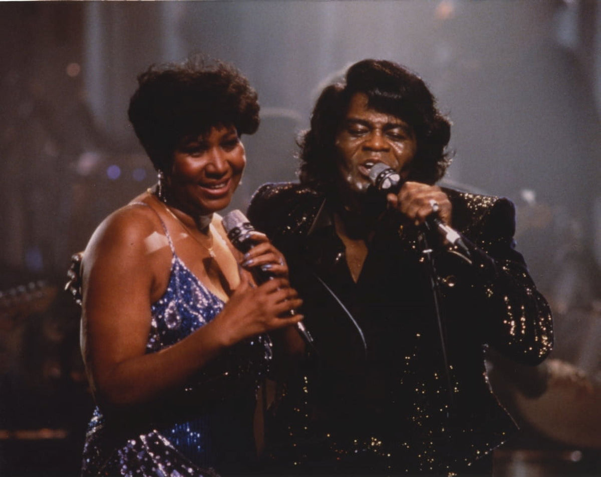 Candid photo print of Aretha Franklin in a glitter dress during a duet.