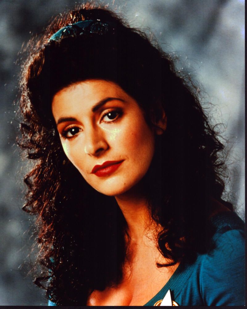 Marina Sirtis headshot photo print in blue top with gray background