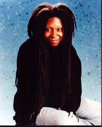 Whoopi Goldberg sitting in jeans with splatter background photo print