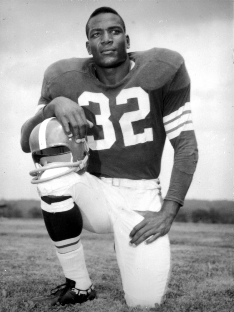 Jim Brown Photo Print capturing the essence of a football legend.