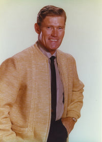 Chuck Connors posed in a brown coat photo print.