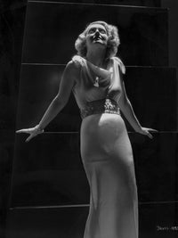 Bette Davis posed in a classic black and white photo print