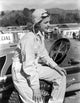 Ann Sheridan sitting on a racing car photo print.