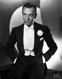 Fred Astaire black and white photo print in tuxedo with hands on pocket.