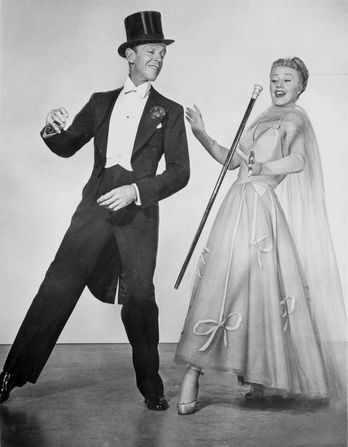 Fred Astaire and Ginger Rogers dancing photo print in classic Hollywood style.