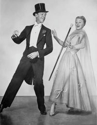 Fred Astaire and Ginger Rogers dancing photo print in classic Hollywood style.
