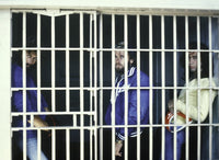 The Bee Gees iconic photo print featuring the band in a prison cell.
