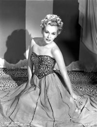 Eva Gabor sitting on the floor photo print, 8 x 10 and 16 x 20 sizes available.