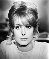 Catherine Deneuve 1962 photo print showcasing cinematic elegance.