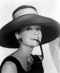 Breakfast At Tiffany's movie photo print showcasing classic cinema charm.