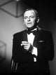 Frank Sinatra smoking a cigarette in a tuxedo photo print