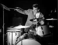 Gene Krupa playing the drums photo print showcasing vibrant energy.