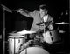 Gene Krupa playing the drums photo print showcasing vibrant energy.