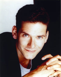 Campbell Scott stylish portrait photo print in black suit and gray shirt.