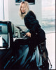 Rosanna Arquette leaning on car photo print