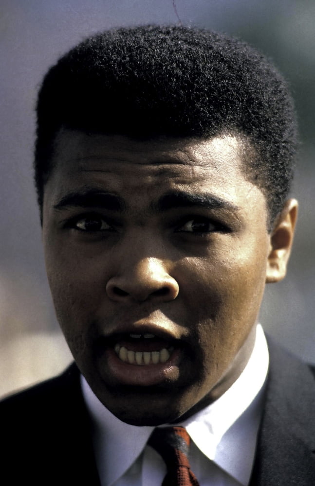 Muhammad Ali making a face photo print, vibrant colors, sports poster