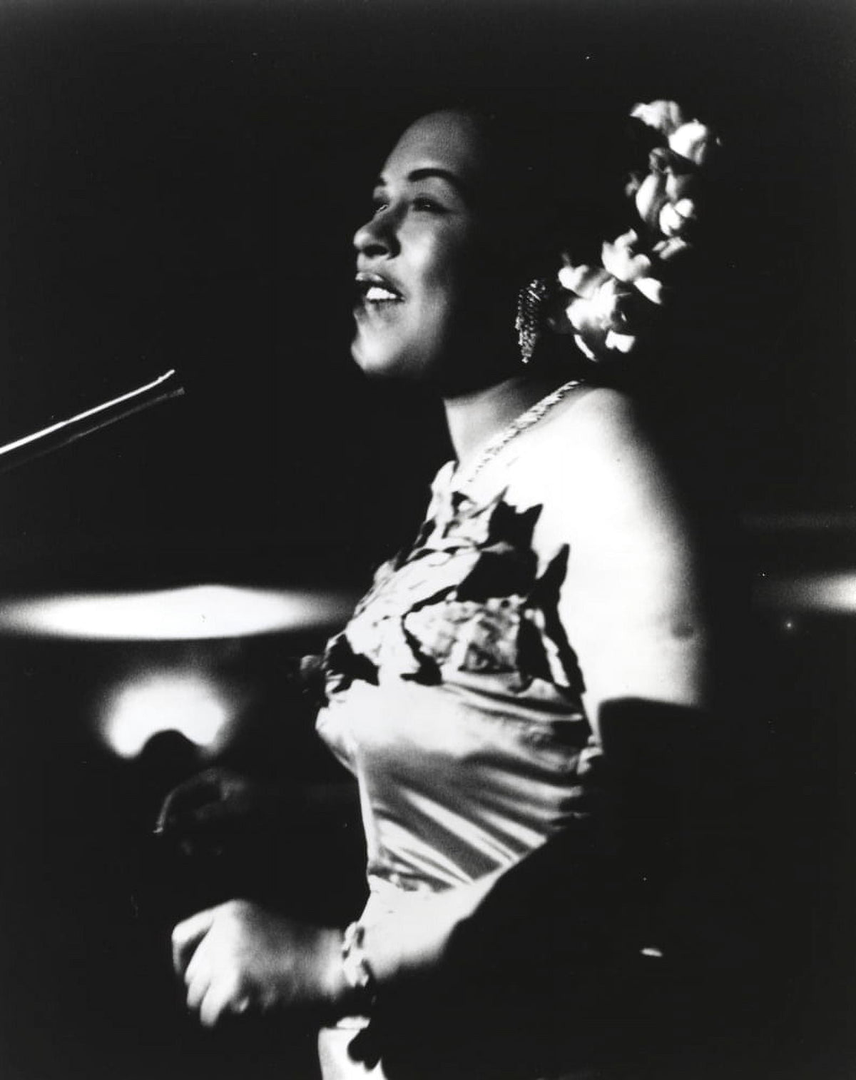 Billie Holiday in gown singing photo print capturing her timeless elegance.