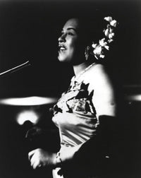 Billie Holiday in gown singing photo print capturing her timeless elegance.