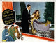 Bringing Up Baby movie poster featuring Cary Grant and Katharine Hepburn.