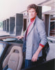 David Hasselhoff standing on a car wearing a grey coat photo print.