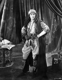 Rudolph Valentino classic photo print with hand on hips.